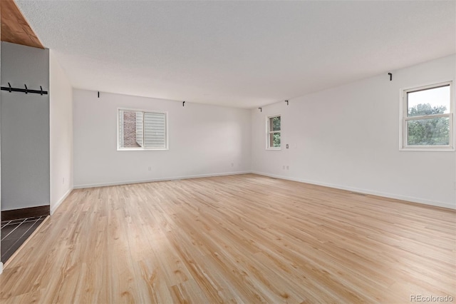 4808 S Ward Way, Morrison, CO 80465 - unfurnished room with light wood-type flooring and baseboards