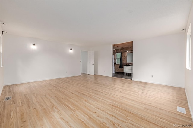 4808 S Ward Way, Morrison, CO 80465 - spare room featuring light wood-style flooring and baseboards