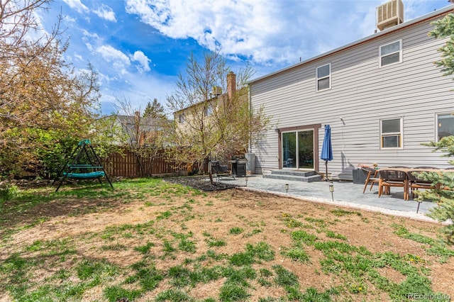 4808 S Ward Way, Morrison, CO 80465 - back of house with a patio area and a chimney