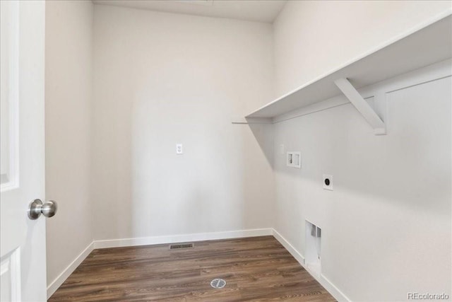 1281 Loraine Cir N, Lafayette, CO 80026 - laundry room with hookup for a washing machine, electric dryer hookup, dark wood-style flooring, and baseboards
