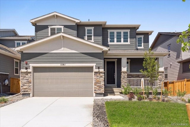 1281 Loraine Cir N, Lafayette, CO 80026 - view of front of house featuring a porch, stone siding, driveway, and a garage
