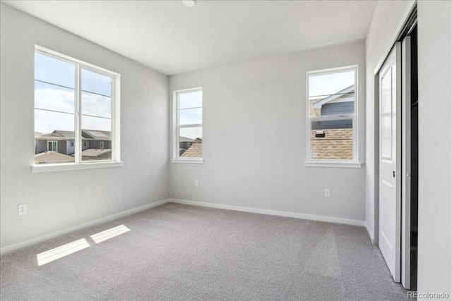 1281 Loraine Cir N, Lafayette, CO 80026 - unfurnished bedroom with carpet flooring, baseboards, and a closet
