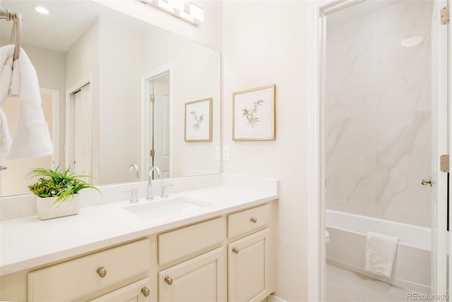 bathroom with vanity and shower / bathing tub combination