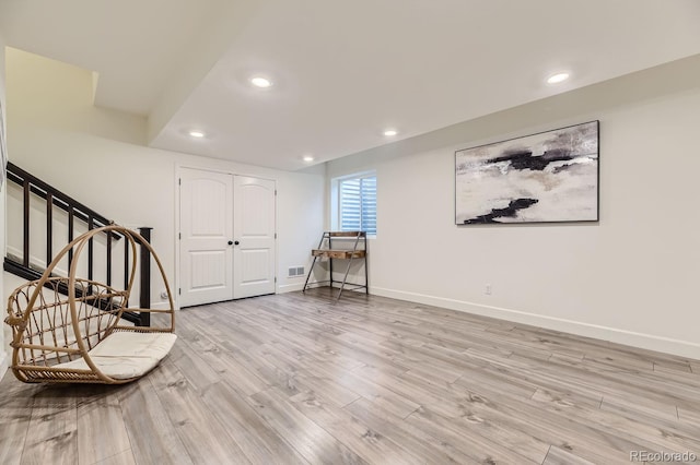 entrance foyer featuring light wood-type flooring