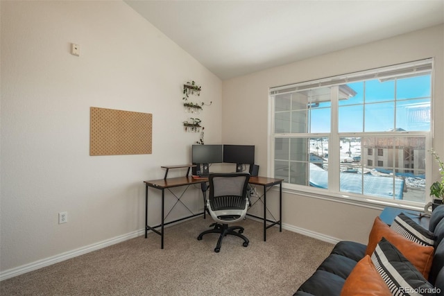 office area featuring carpet flooring and lofted ceiling