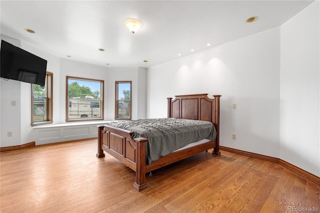 1195 W 70th Ave, Denver, CO 80221 - bedroom with light wood-style flooring and recessed lighting