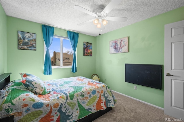 8815 W Quarto Cir, Littleton, CO 80128 - carpeted bedroom featuring a textured ceiling, a ceiling fan, and baseboards