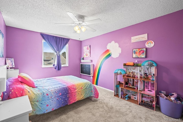 8815 W Quarto Cir, Littleton, CO 80128 - carpeted bedroom with a textured ceiling and ceiling fan