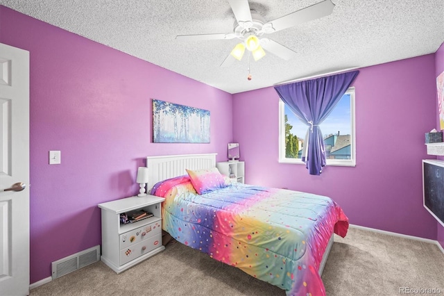 8815 W Quarto Cir, Littleton, CO 80128 - bedroom featuring carpet floors, a textured ceiling, ceiling fan, and baseboards