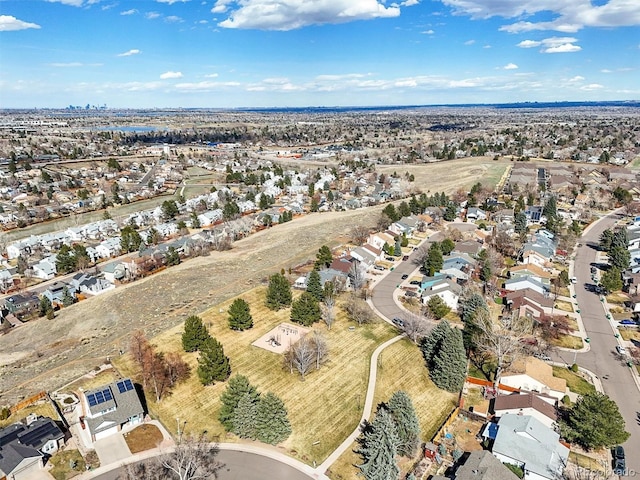 8815 W Quarto Cir, Littleton, CO 80128 - aerial overview of property's location featuring nearby suburban area