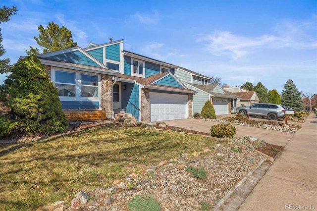 8815 W Quarto Cir, Littleton, CO 80128 - view of front of house featuring a garage, driveway, a front lawn, and brick siding