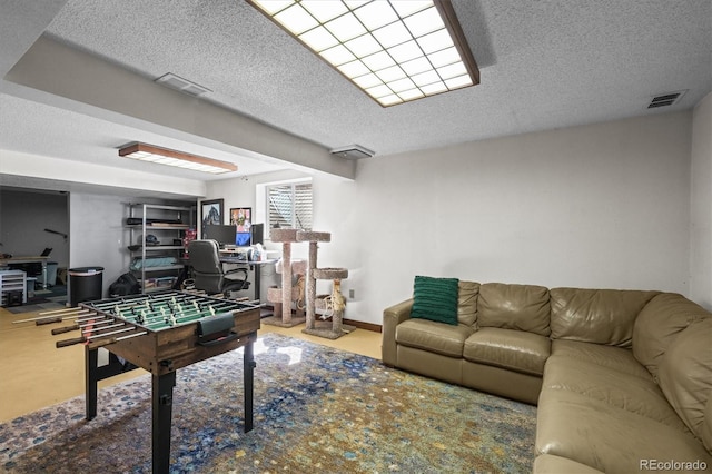 8815 W Quarto Cir, Littleton, CO 80128 - recreation room with a textured ceiling and an office area
