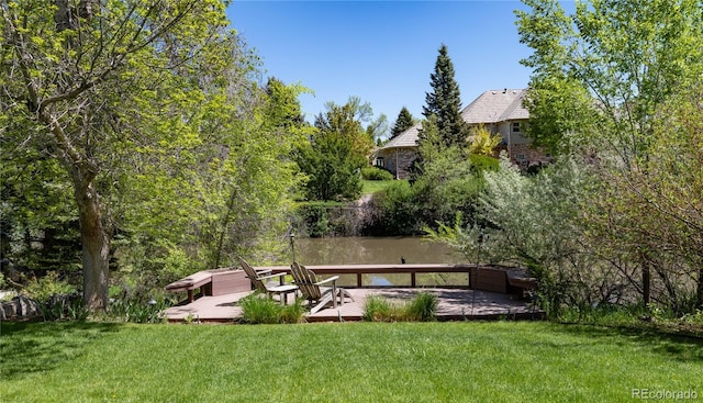 4483 W Cottonwood Pl, Littleton, CO 80123 - view of grassy yard with a deck