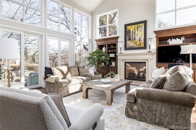 4483 W Cottonwood Pl, Littleton, CO 80123 - sunroom / solarium featuring healthy amount of natural light and vaulted ceiling