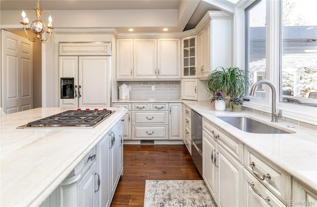 4483 W Cottonwood Pl, Littleton, CO 80123 - kitchen featuring a sink, stainless steel appliances, dark wood-style flooring, recessed lighting, and backsplash