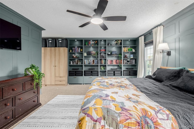 16051 E Alabama Dr, Aurora, CO 80017 - bedroom featuring carpet, a textured ceiling, and ceiling fan