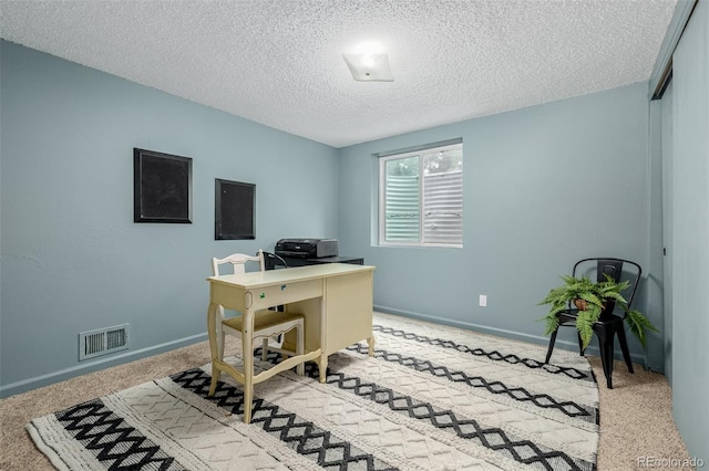 16051 E Alabama Dr, Aurora, CO 80017 - carpeted office featuring a textured ceiling and baseboards