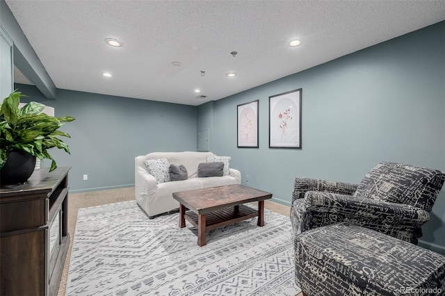 16051 E Alabama Dr, Aurora, CO 80017 - living area featuring light carpet, recessed lighting, and a textured ceiling