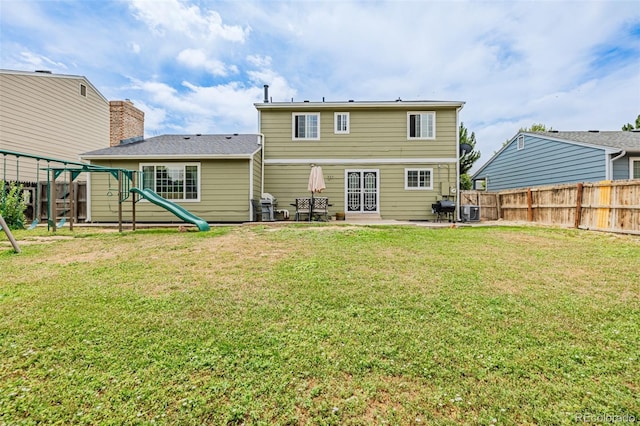 16051 E Alabama Dr, Aurora, CO 80017 - back of house with a playground and a patio