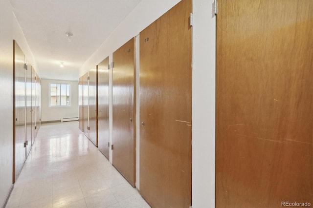 corridor with a baseboard radiator