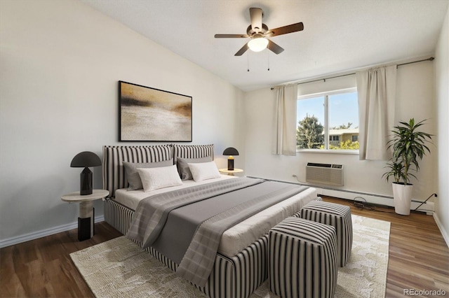 bedroom with vaulted ceiling, a wall mounted AC, hardwood / wood-style flooring, and ceiling fan