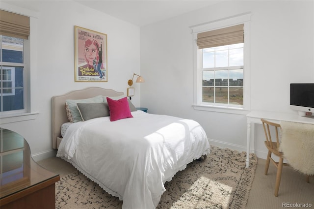 6288 N Dallas St, Denver, CO 80238 - carpeted bedroom featuring baseboards