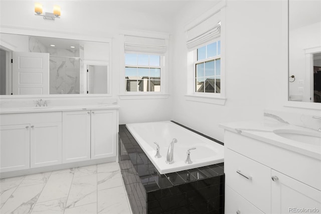 6288 N Dallas St, Denver, CO 80238 - bathroom with two vanities, a bath, marble look tiles, and a marble finish shower