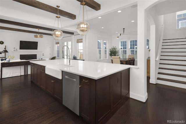 6288 N Dallas St, Denver, CO 80238 - kitchen featuring dishwasher, open floor plan, dark wood-style floors, dark brown cabinetry, and beam ceiling