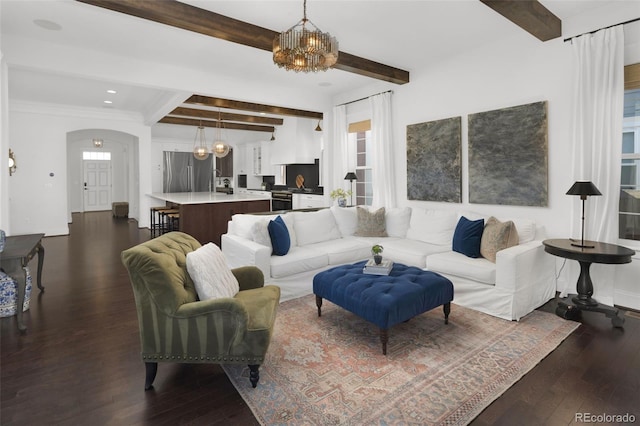 6288 N Dallas St, Denver, CO 80238 - living room featuring beam ceiling, a chandelier, dark wood-type flooring, arched walkways, and recessed lighting