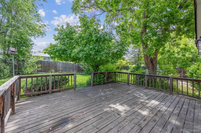 8552 Gray Ct, Arvada, CO 80003 - wooden deck with a fenced backyard