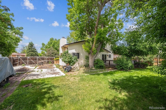 8552 Gray Ct, Arvada, CO 80003 - view of yard with a deck and a patio