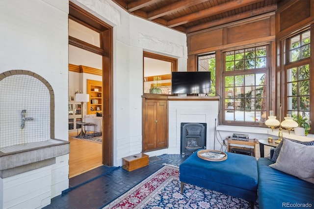 1401 N Franklin St Unit 1, Denver, CO 80218 - living area with wooden ceiling, beam ceiling, and brick patterned floors