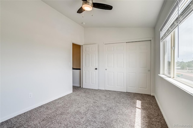 2642 Devonshire Ct, Denver, CO 80229 - unfurnished bedroom featuring vaulted ceiling, carpet floors, baseboards, a closet, and ceiling fan