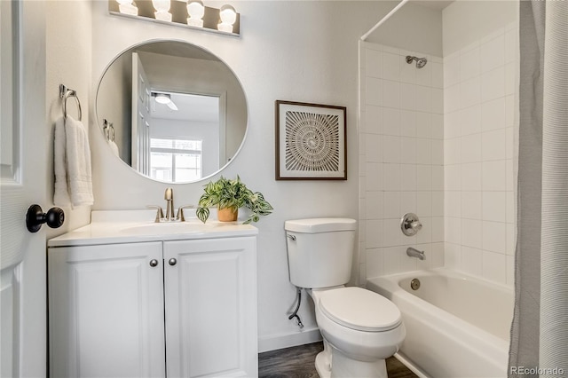 2642 Devonshire Ct, Denver, CO 80229 - bathroom with toilet, shower / tub combo, vanity, and baseboards
