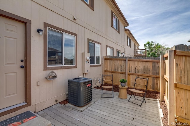 2642 Devonshire Ct, Denver, CO 80229 - wooden deck featuring cooling unit