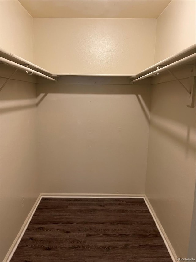 14704 E 2nd Ave Unit 300E, Aurora, CO 80011 - spacious closet featuring wood finished floors