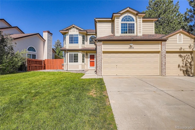 5370 S Jebel St, Centennial, CO 80015 - traditional-style house with driveway, a garage, and a shingled roof