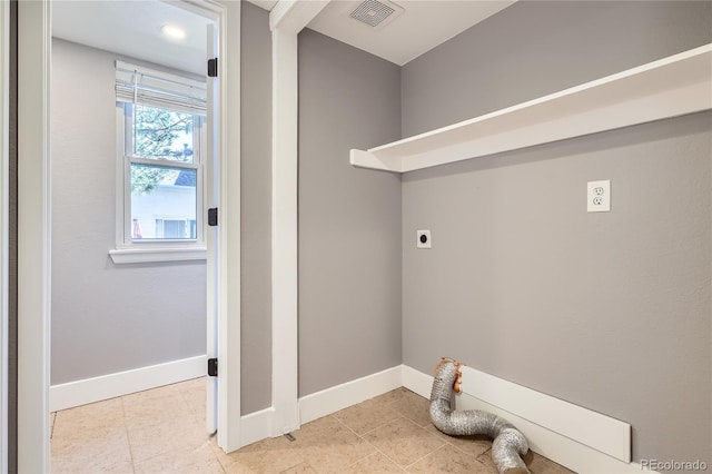 5370 S Jebel St, Centennial, CO 80015 - laundry room featuring electric dryer hookup and light tile patterned floors