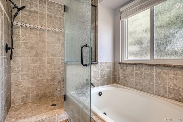 5370 S Jebel St, Centennial, CO 80015 - full bath featuring a shower stall and a garden tub