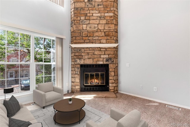2973 W 81st Ave Unit D, Westminster, CO 80031 - carpeted living room with a fireplace and baseboards