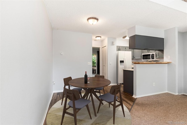 2973 W 81st Ave Unit D, Westminster, CO 80031 - dining space with a textured ceiling