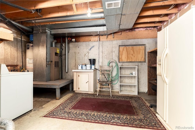 2973 W 81st Ave Unit D, Westminster, CO 80031 - unfinished basement with washer / dryer, white fridge with ice dispenser, water heater, and heating unit