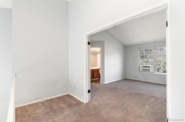2973 W 81st Ave Unit D, Westminster, CO 80031 - unfurnished room with carpet, lofted ceiling, and cooling unit
