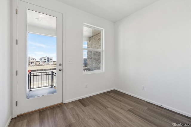 doorway to outside featuring hardwood / wood-style floors