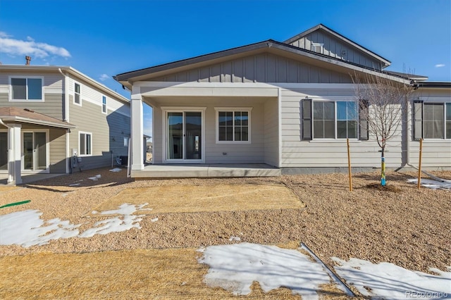 rear view of property featuring a patio