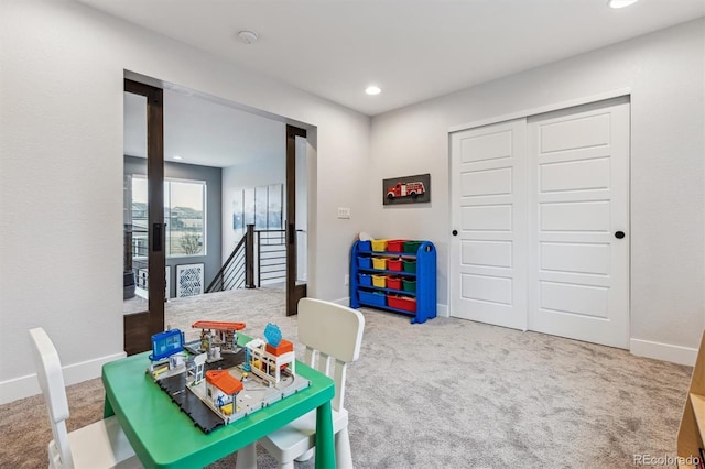 rec room featuring baseboards, carpet, and recessed lighting