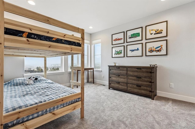 carpeted bedroom featuring recessed lighting and baseboards