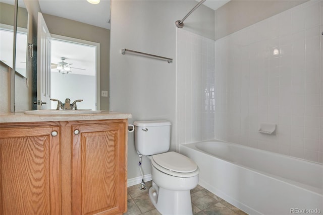 full bathroom featuring vanity, ceiling fan, tile patterned flooring, toilet, and tiled shower / bath