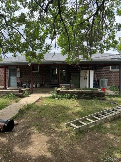 8250 Ralph Ln, Denver, CO 80221 - back of property with brick siding