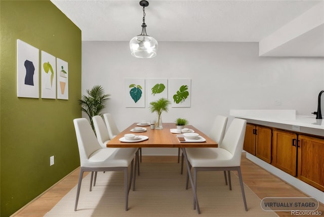 dining room featuring light wood-type flooring